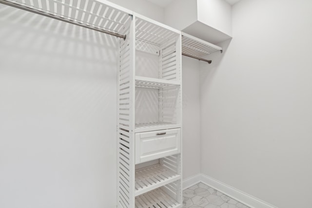 86 W N Broadway, Columbus, OH 43214 - walk in closet featuring light tile patterned flooring