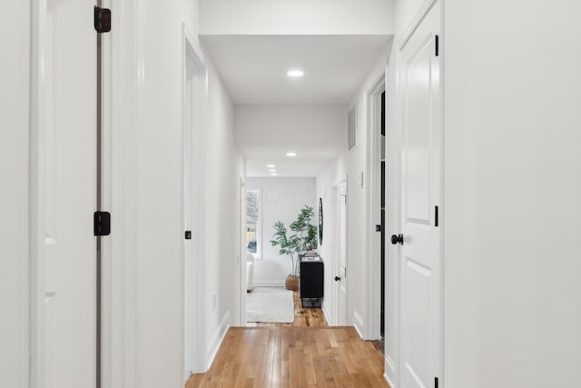 86 W N Broadway, Columbus, OH 43214 - hall with light wood-style flooring and recessed lighting