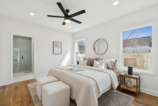 86 W N Broadway, Columbus, OH 43214 - bedroom featuring recessed lighting, wood finished floors, ensuite bath, and ceiling fan