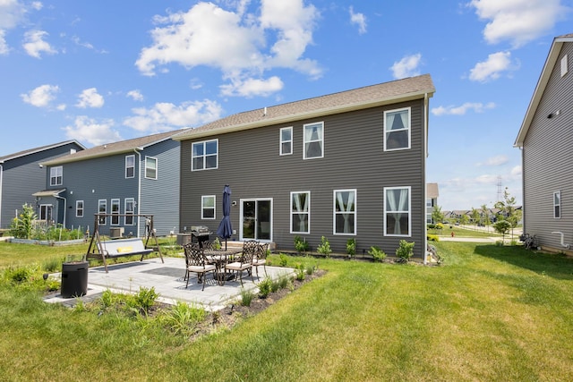 6750 Constitution Way, Powell, OH 43065 - back of property featuring a patio area and a lawn