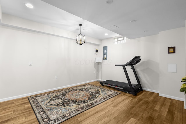 6750 Constitution Way, Powell, OH 43065 - exercise area featuring wood finished floors, recessed lighting, and electric panel
