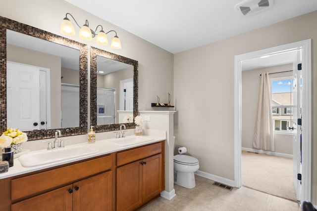6750 Constitution Way, Powell, OH 43065 - bathroom featuring double vanity and a shower with door