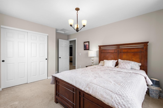 6750 Constitution Way, Powell, OH 43065 - bedroom with light carpet, a closet, and a chandelier