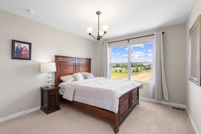 6750 Constitution Way, Powell, OH 43065 - bedroom featuring light carpet and a chandelier