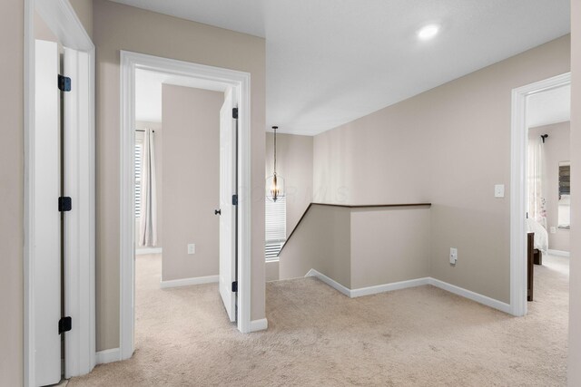 6750 Constitution Way, Powell, OH 43065 - hallway with an upstairs landing and carpet floors