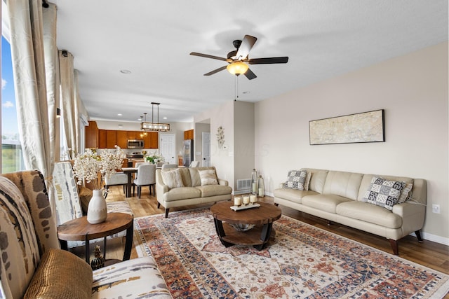 6750 Constitution Way, Powell, OH 43065 - living area featuring light wood-style floors, a ceiling fan, and recessed lighting