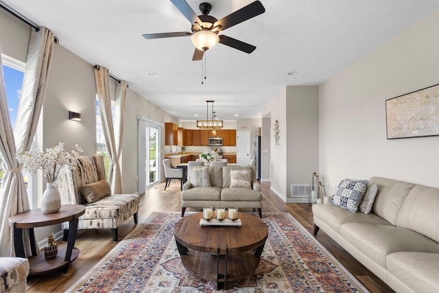 6750 Constitution Way, Powell, OH 43065 - living room featuring light wood finished floors, a ceiling fan, and recessed lighting