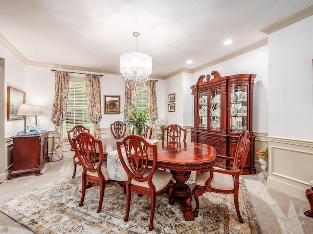 6676 Ballantrae Pl, Dublin, OH 43016 - dining area featuring ornamental molding, light colored carpet, a chandelier, wainscoting, and recessed lighting