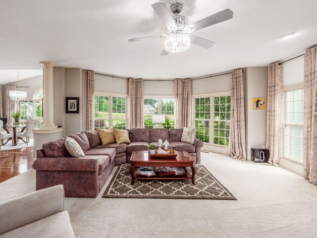 6676 Ballantrae Pl, Dublin, OH 43016 - living area featuring ornate columns, a ceiling fan, and carpet flooring