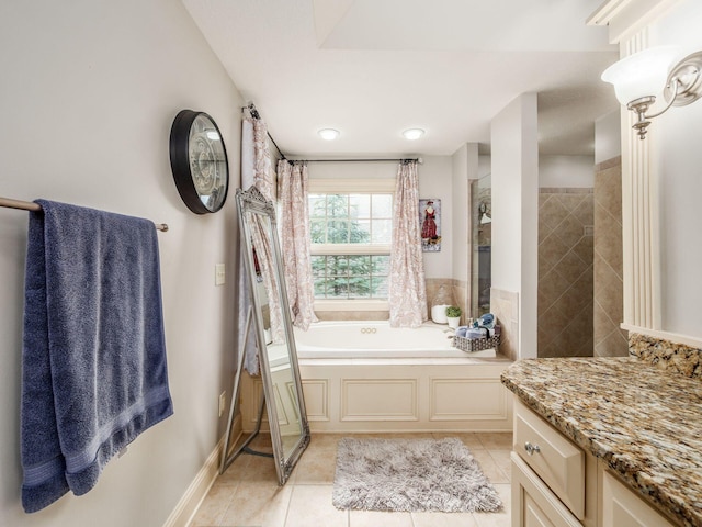 6676 Ballantrae Pl, Dublin, OH 43016 - bathroom featuring a bath, tile patterned floors, and vanity