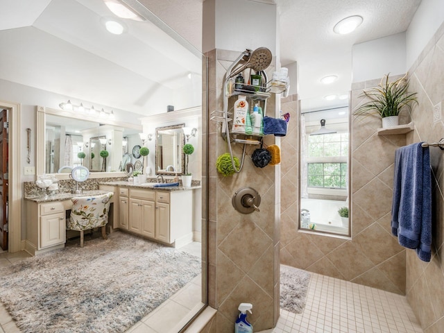 6676 Ballantrae Pl, Dublin, OH 43016 - bathroom with tile patterned floors, a walk in shower, and vanity