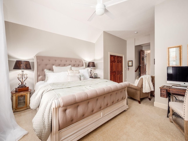 6676 Ballantrae Pl, Dublin, OH 43016 - bedroom featuring light colored carpet, a closet, vaulted ceiling, and a ceiling fan