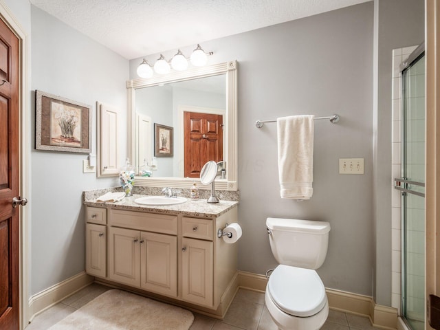6676 Ballantrae Pl, Dublin, OH 43016 - full bathroom featuring vanity, a shower with shower door, and tile patterned flooring