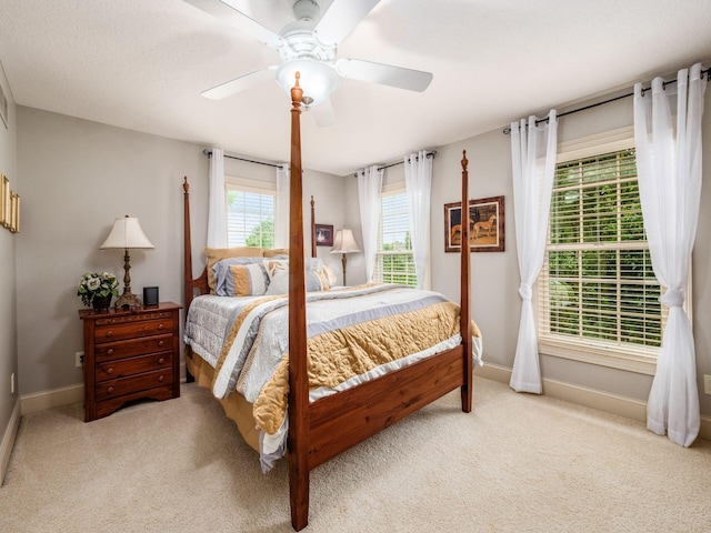 6676 Ballantrae Pl, Dublin, OH 43016 - carpeted bedroom featuring baseboards and a ceiling fan