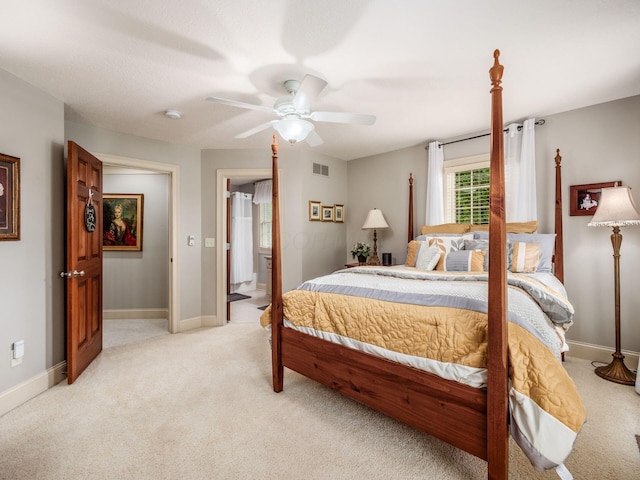 6676 Ballantrae Pl, Dublin, OH 43016 - bedroom featuring light carpet, ceiling fan, and connected bathroom