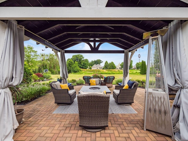 6676 Ballantrae Pl, Dublin, OH 43016 - view of patio with a gazebo and an outdoor living space with a fire pit