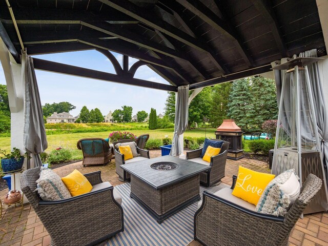 6676 Ballantrae Pl, Dublin, OH 43016 - view of patio with a gazebo and an outdoor living space with a fire pit