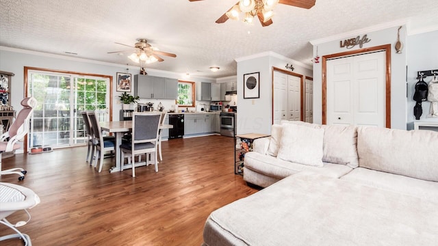 13376 Maple Rd NE, Thornville, OH 43076 - living area featuring ceiling fan, crown molding, wood finished floors, and a textured ceiling