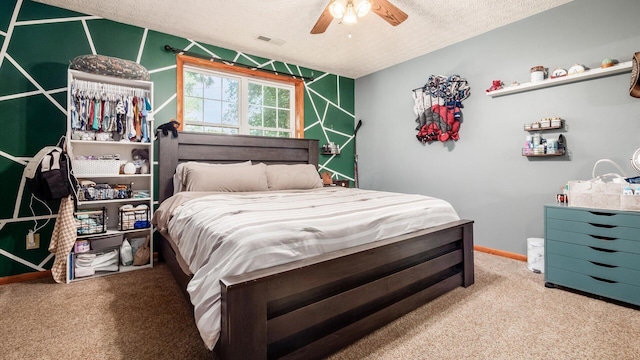 13376 Maple Rd NE, Thornville, OH 43076 - carpeted bedroom featuring a textured ceiling and ceiling fan