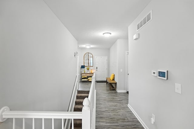 172 Rosewood Loop SE, Commercial Point, OH 43116 - hall with dark wood-type flooring and baseboards