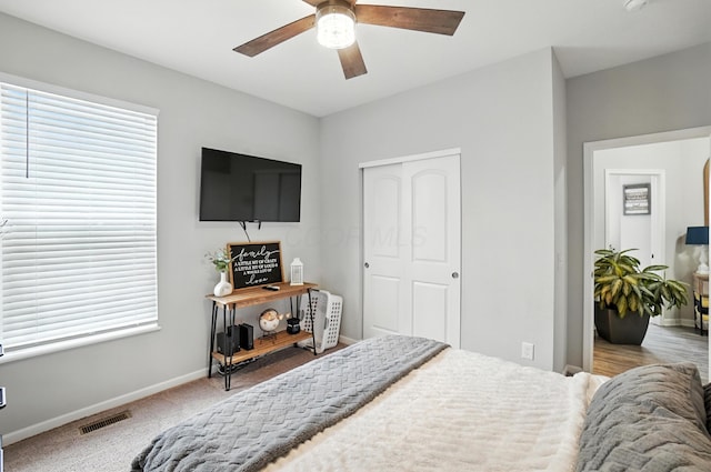 172 Rosewood Loop SE, Commercial Point, OH 43116 - carpeted bedroom featuring a closet and a ceiling fan