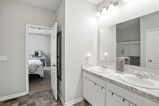 172 Rosewood Loop SE, Commercial Point, OH 43116 - full bath featuring double vanity, connected bathroom, and stone finish flooring