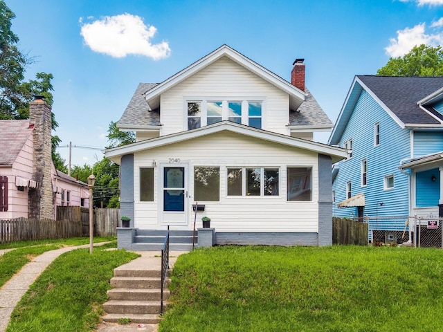 2040 Fairmont Ave, Columbus, OH 43223 - american foursquare style home featuring roof with shingles and a chimney