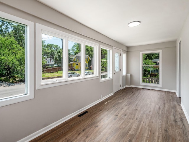 2040 Fairmont Ave, Columbus, OH 43223 - spare room featuring baseboards and wood finished floors