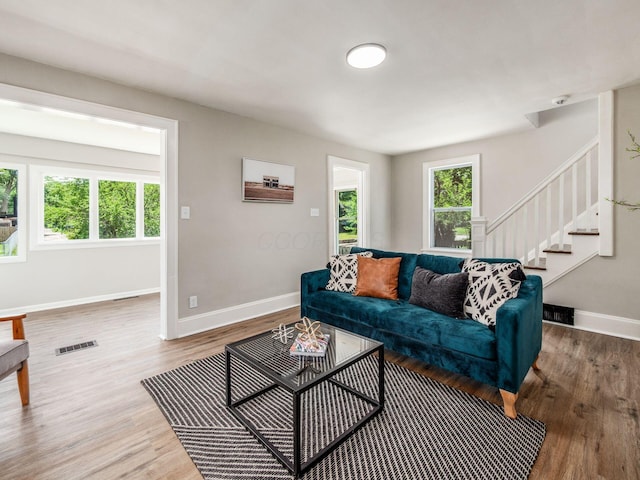 2040 Fairmont Ave, Columbus, OH 43223 - living room with wood finished floors and stairway