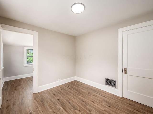 2040 Fairmont Ave, Columbus, OH 43223 - spare room with wood finished floors