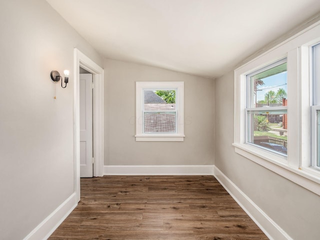 2040 Fairmont Ave, Columbus, OH 43223 - empty room with vaulted ceiling and wood finished floors