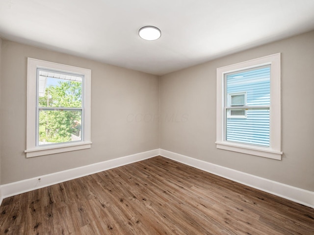 2040 Fairmont Ave, Columbus, OH 43223 - empty room featuring baseboards and wood finished floors