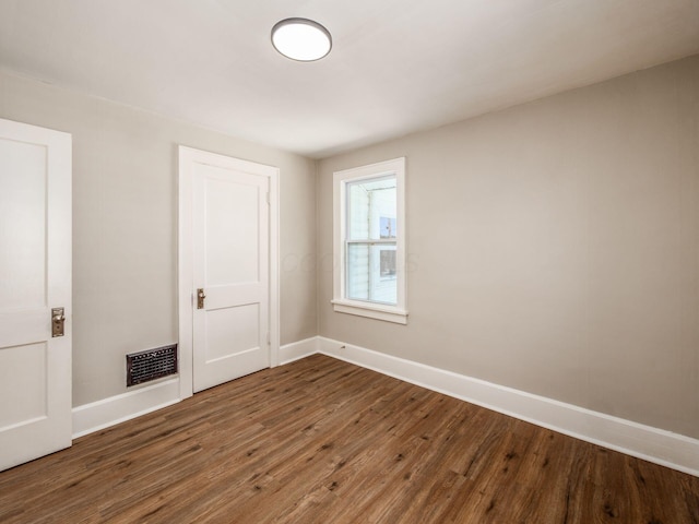 2040 Fairmont Ave, Columbus, OH 43223 - spare room with wood finished floors and baseboards