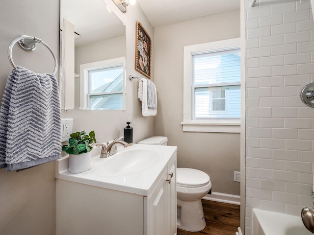 2040 Fairmont Ave, Columbus, OH 43223 - full bathroom with vanity, wood finished floors, and shower / bathtub combination
