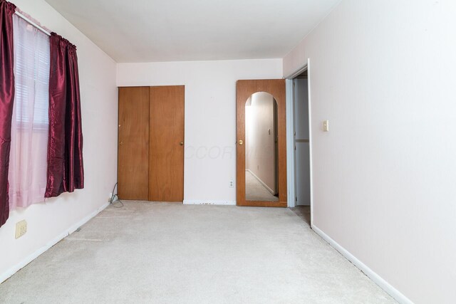 5375 Fullerton Dr, Columbus, OH 43232 - unfurnished bedroom featuring carpet floors and arched walkways