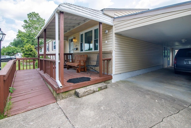 5375 Fullerton Dr, Columbus, OH 43232 - deck with an attached carport and concrete driveway