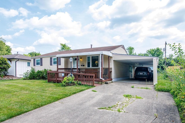 5375 Fullerton Dr, Columbus, OH 43232 - view of front of property with a porch, asphalt driveway, a front yard, and a carport