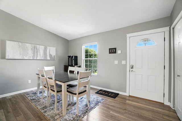 6803 Alex Dr, Canal Winchester, OH 43110 - dining room featuring hardwood / wood-style floors and lofted ceiling