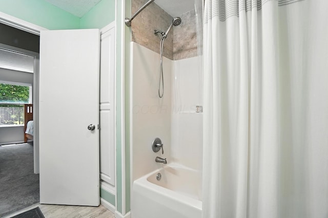 6803 Alex Dr, Canal Winchester, OH 43110 - bathroom with shower / tub combo, connected bathroom, and wood finished floors