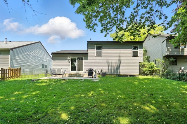 6803 Alex Dr, Canal Winchester, OH 43110 - back of house with entry steps, a fenced backyard, and a patio area