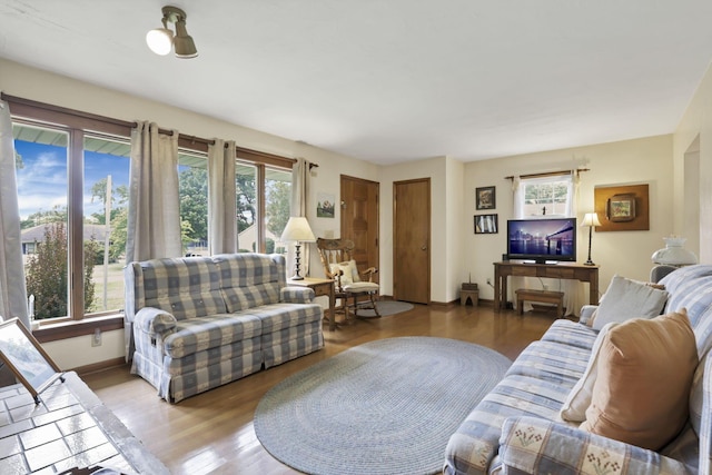 784 Colonial Dr, Heath, OH 43056 - living area with plenty of natural light and wood finished floors