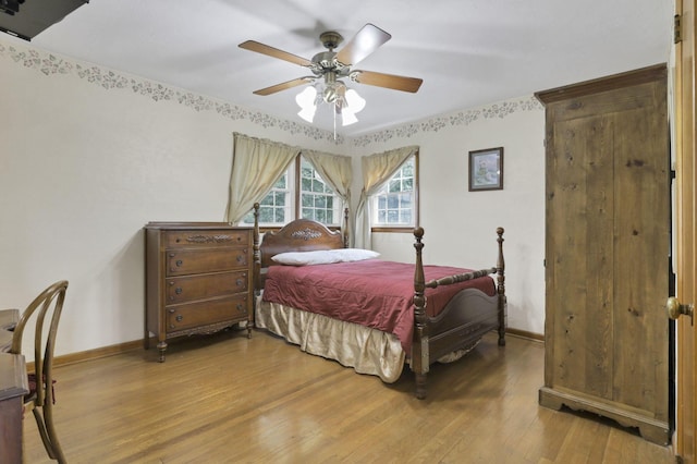 784 Colonial Dr, Heath, OH 43056 - bedroom with light wood-style flooring and a ceiling fan