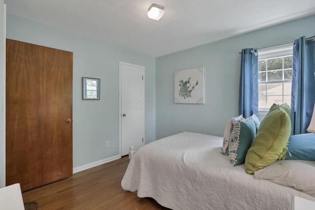784 Colonial Dr, Heath, OH 43056 - bedroom featuring wood finished floors and baseboards