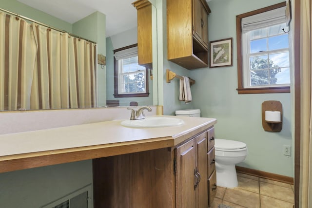 784 Colonial Dr, Heath, OH 43056 - bathroom featuring vanity, plenty of natural light, and tile patterned flooring