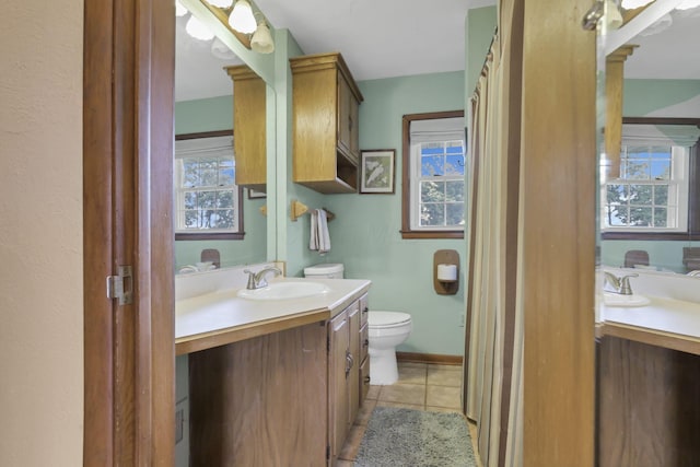 784 Colonial Dr, Heath, OH 43056 - bathroom featuring vanity, tile patterned flooring, and healthy amount of natural light
