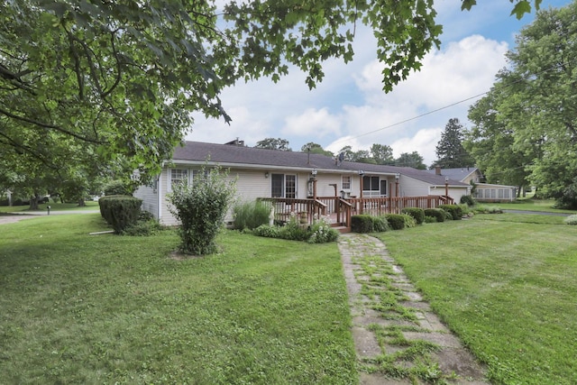 784 Colonial Dr, Heath, OH 43056 - view of front facade with a deck and a front lawn
