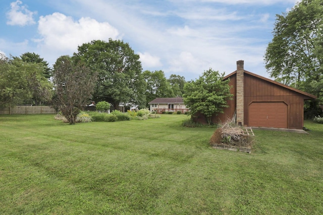 784 Colonial Dr, Heath, OH 43056 - view of yard with an attached garage