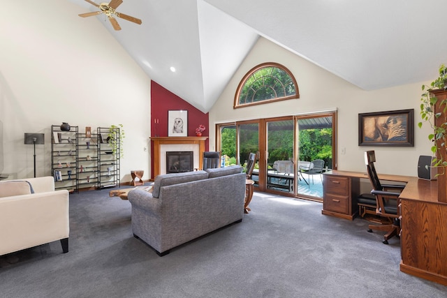 5232 Lola Way, Columbus, OH 43235 - living room featuring carpet, high vaulted ceiling, a desk, a glass covered fireplace, and ceiling fan