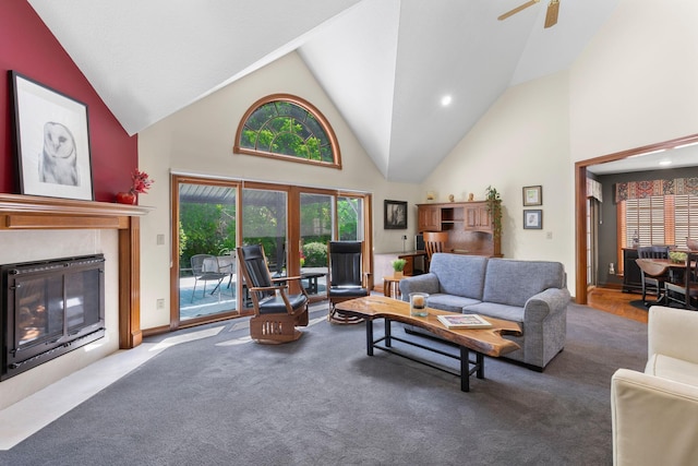 5232 Lola Way, Columbus, OH 43235 - living room featuring high vaulted ceiling, a fireplace with flush hearth, carpet, and ceiling fan
