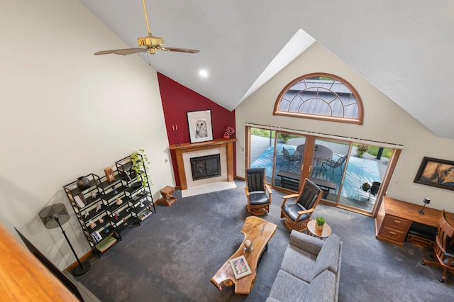 5232 Lola Way, Columbus, OH 43235 - carpeted living area with high vaulted ceiling, a tile fireplace, and ceiling fan